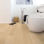 Laminate flooring is better for bathrooms and other areas prone to spills