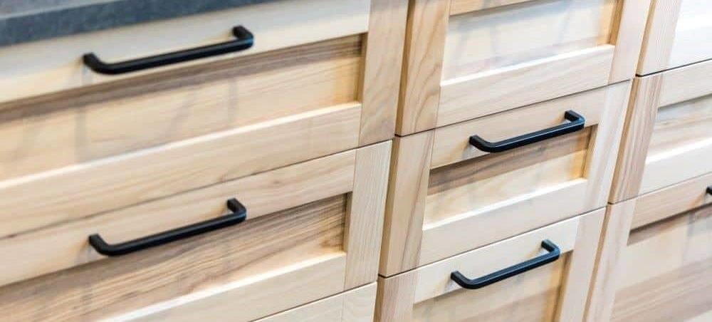 Upgrade your cabinet doors with leftover flooring scraps.