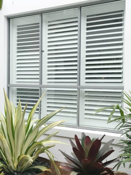 Outside view of shutters with split tilt rod.