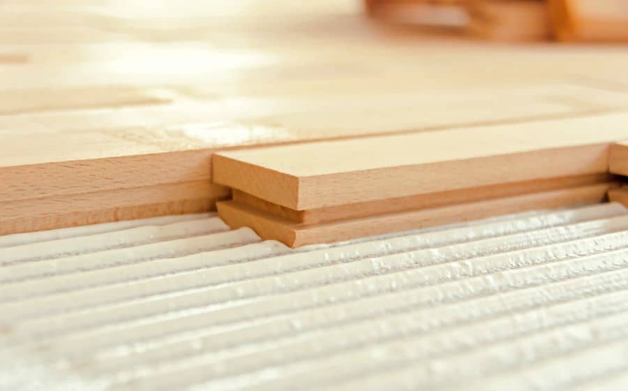 For direct sticking to the subfloor, a tongue and groove system is the easiest option to use.