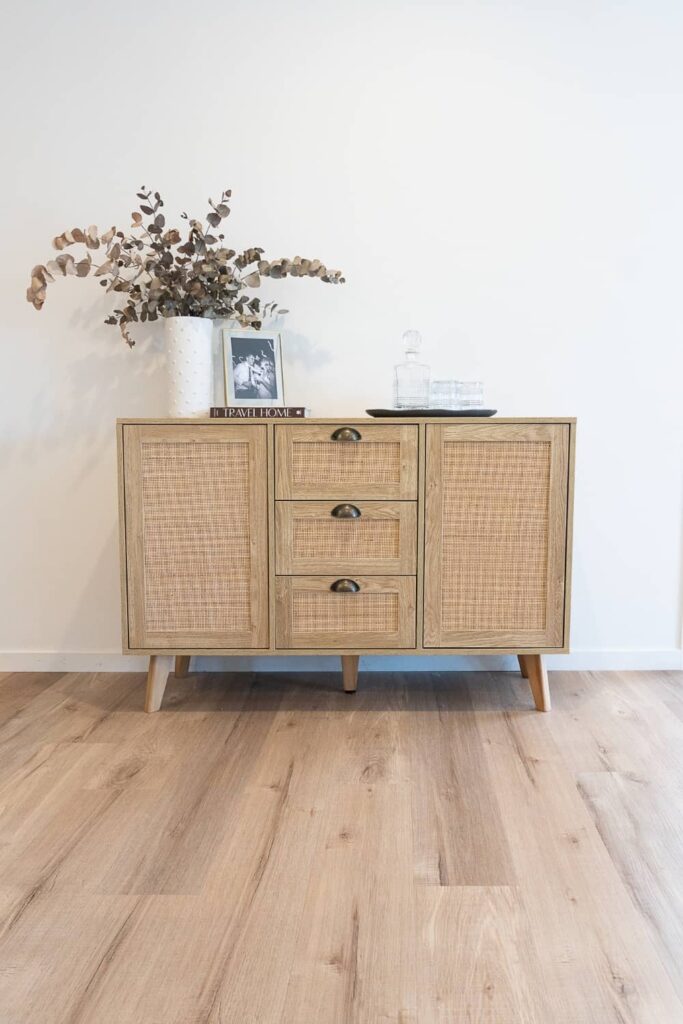 Wooden cabinet in living area.