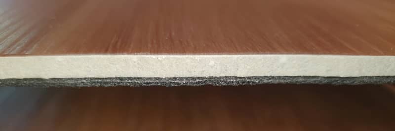 Cross Section of Solid Core WPC Hybrid Flooring Plank.