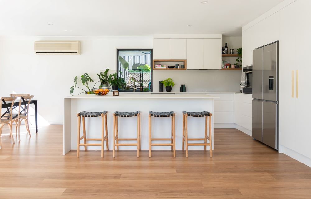 Kitchen with hybrid flooring.