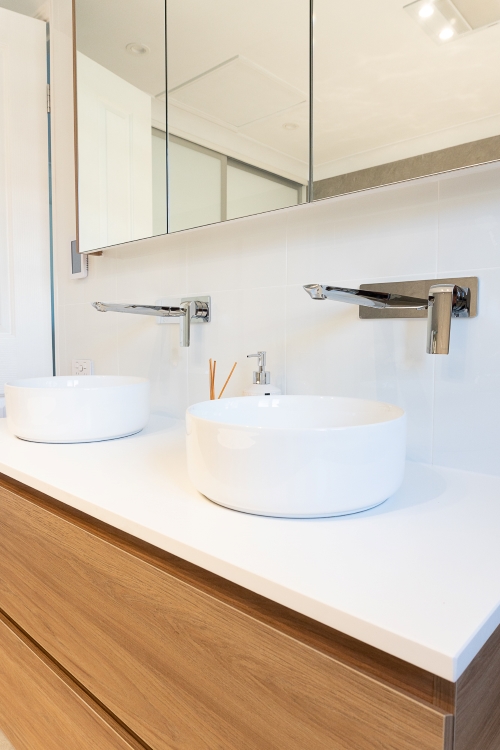 Bathroom sinks, his and hers.