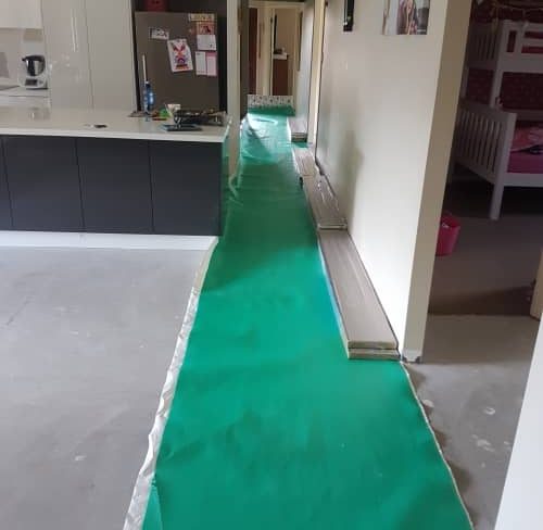 Putting builder's plastic for installation.