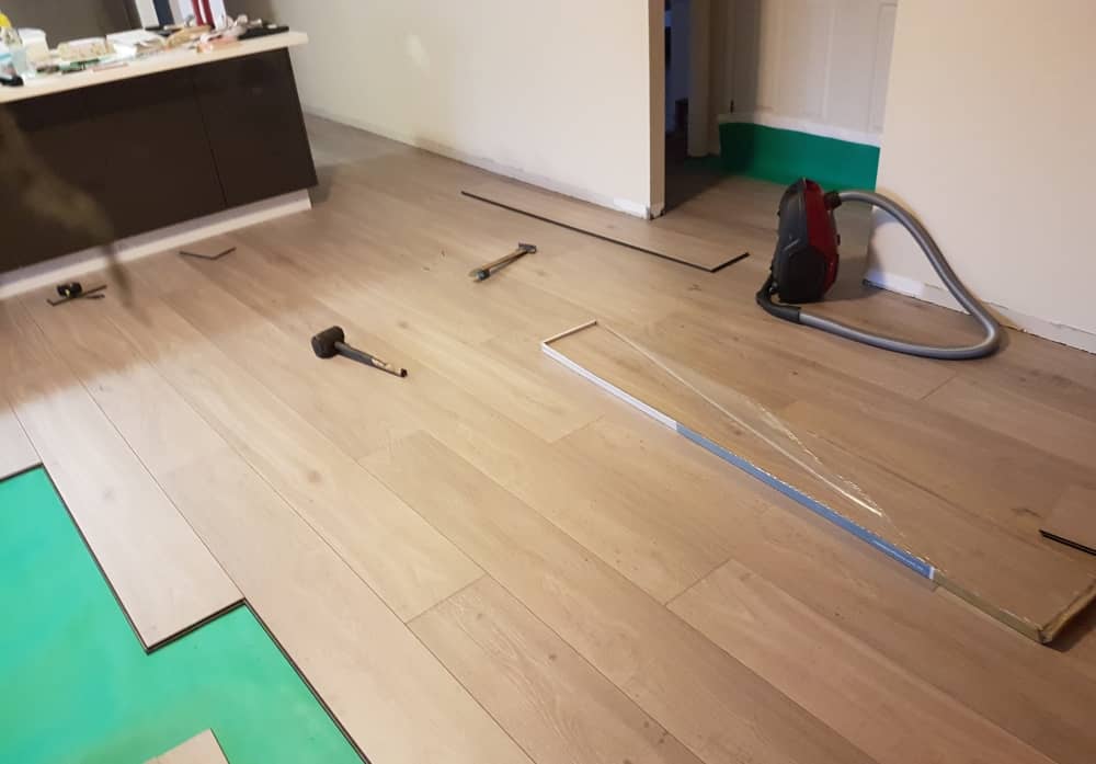 Laminate flooring installation.