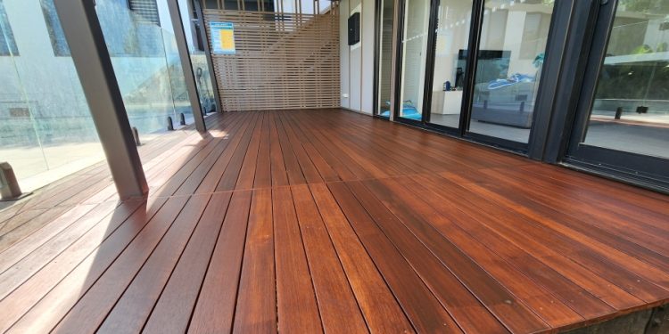 Sanding and treating your deck is an essential part of deck maintenance that helps to preserve its appearance, durability, and longevity.