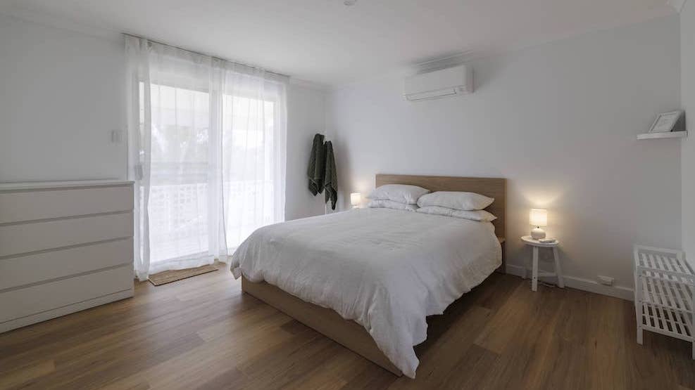 Bright retreat bedroom featuring Eclipse Hybrid with Nazca flooring in Moore River accommodation