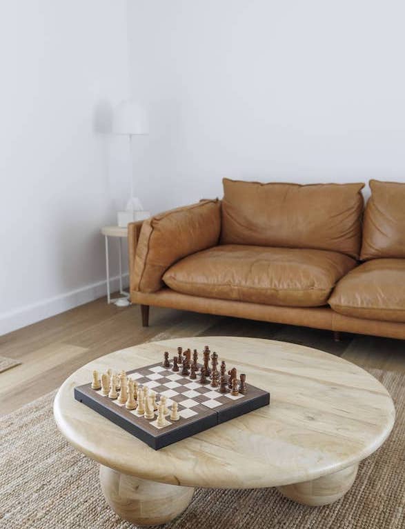 Cosy lounge with chess set and Eclipse Hybrid with Nazca flooring in retreat living area