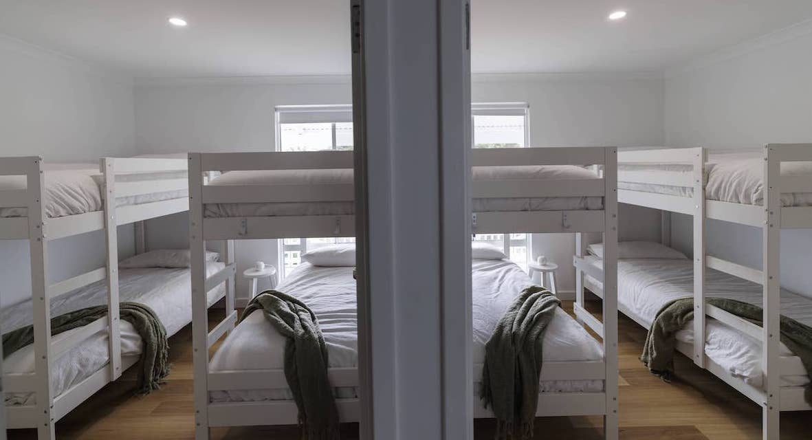 Spacious bunk room at short stay retreat with Eclipse Hybrid with Nazca flooring throughout